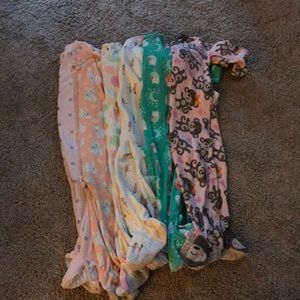 6 pair of Carter’s pajamas.